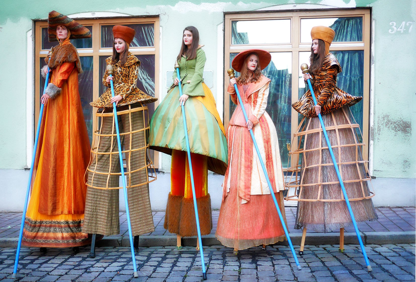 Four people wearing costumes