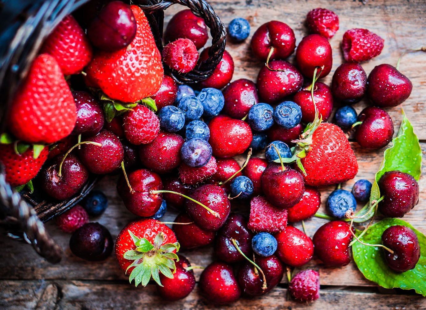 Strawberry, blueberry, raspberry and blackberry in basket