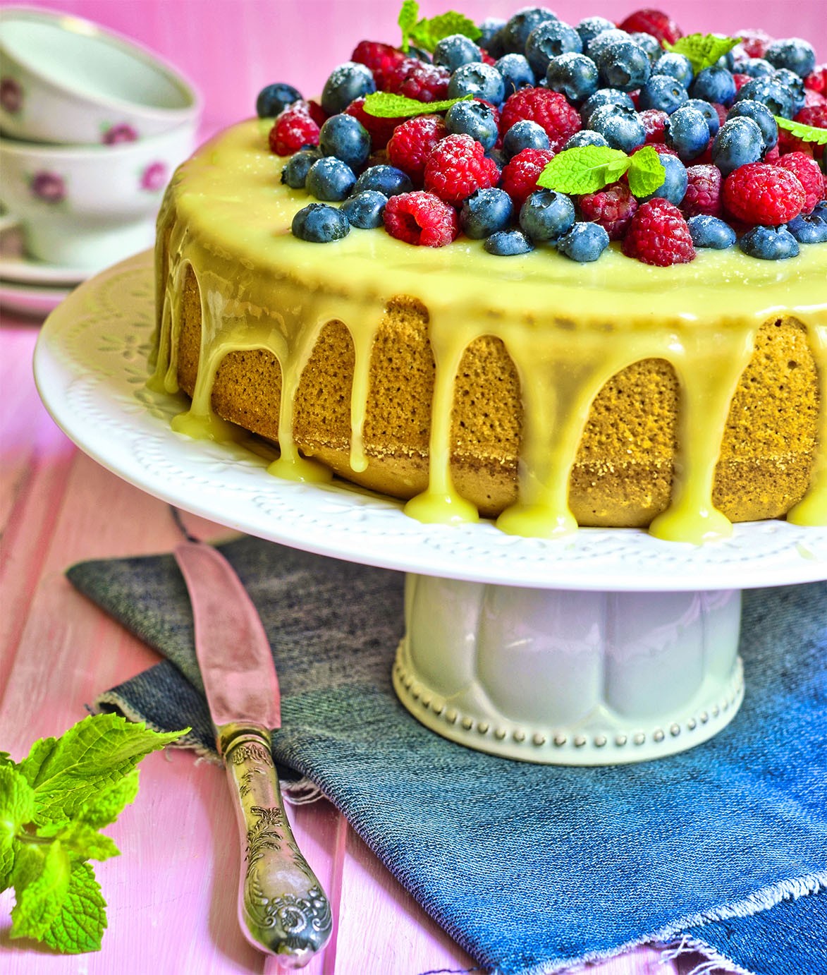 Cake with frosting and blueberries