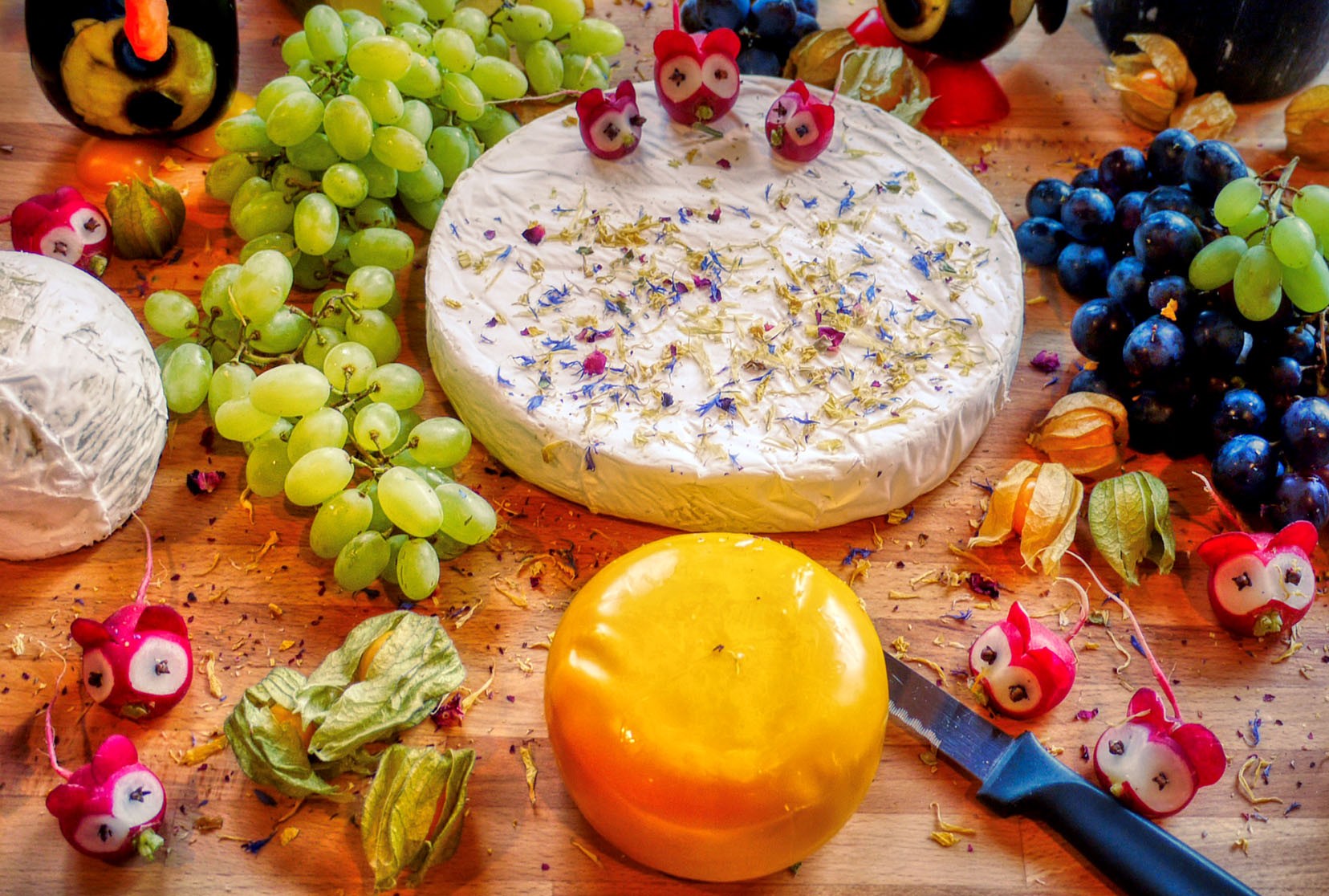 Cheese and grapes on platter