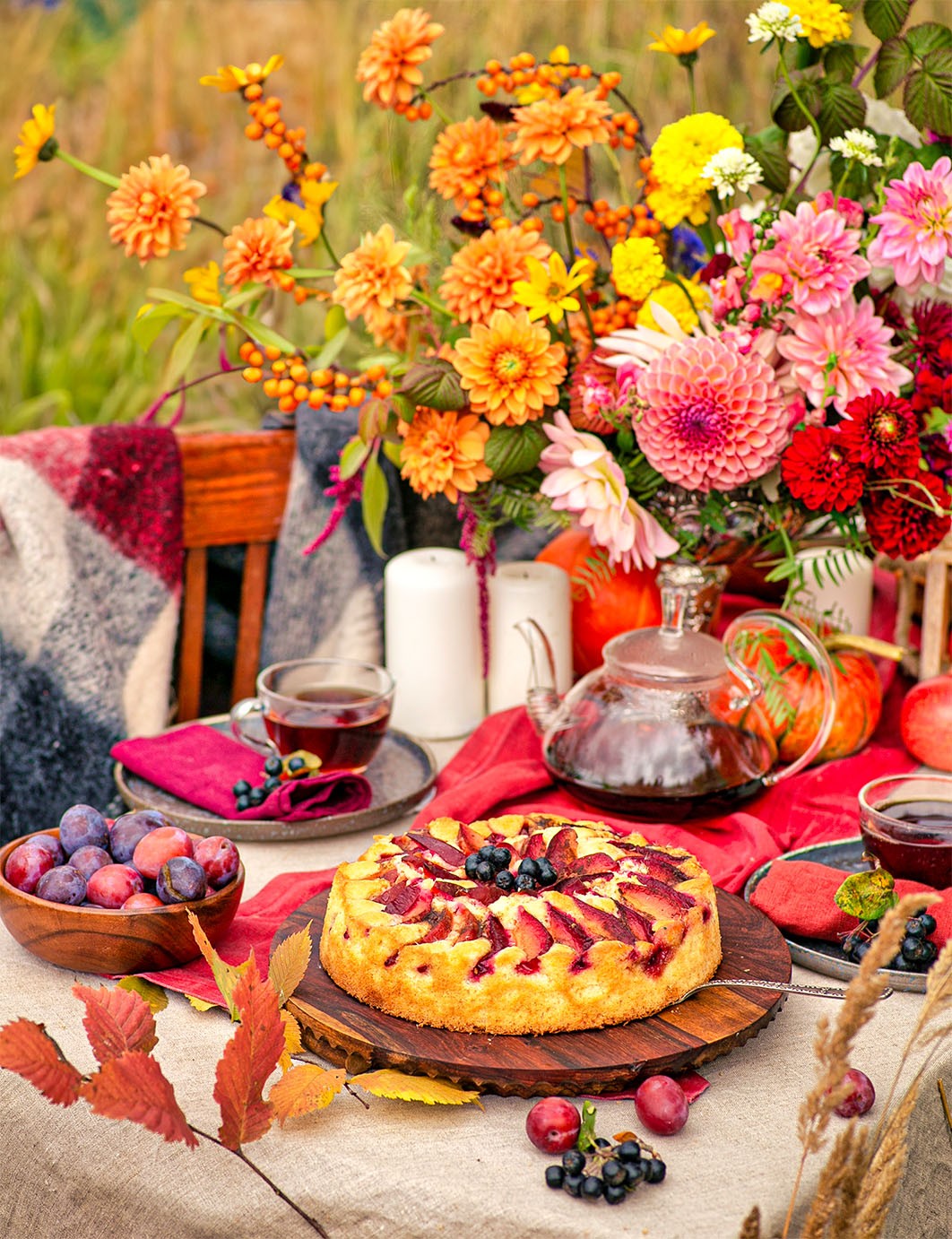 Delicious cake surrounded by fall decorations