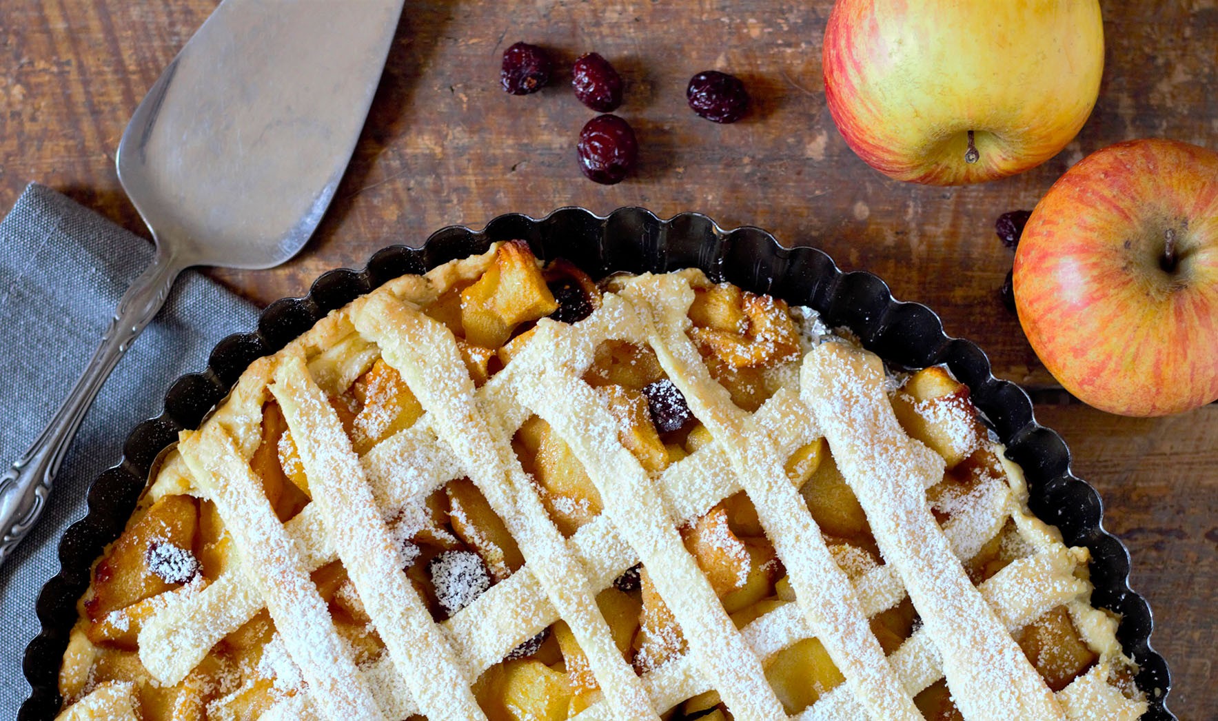 Fruit pie with crust on board