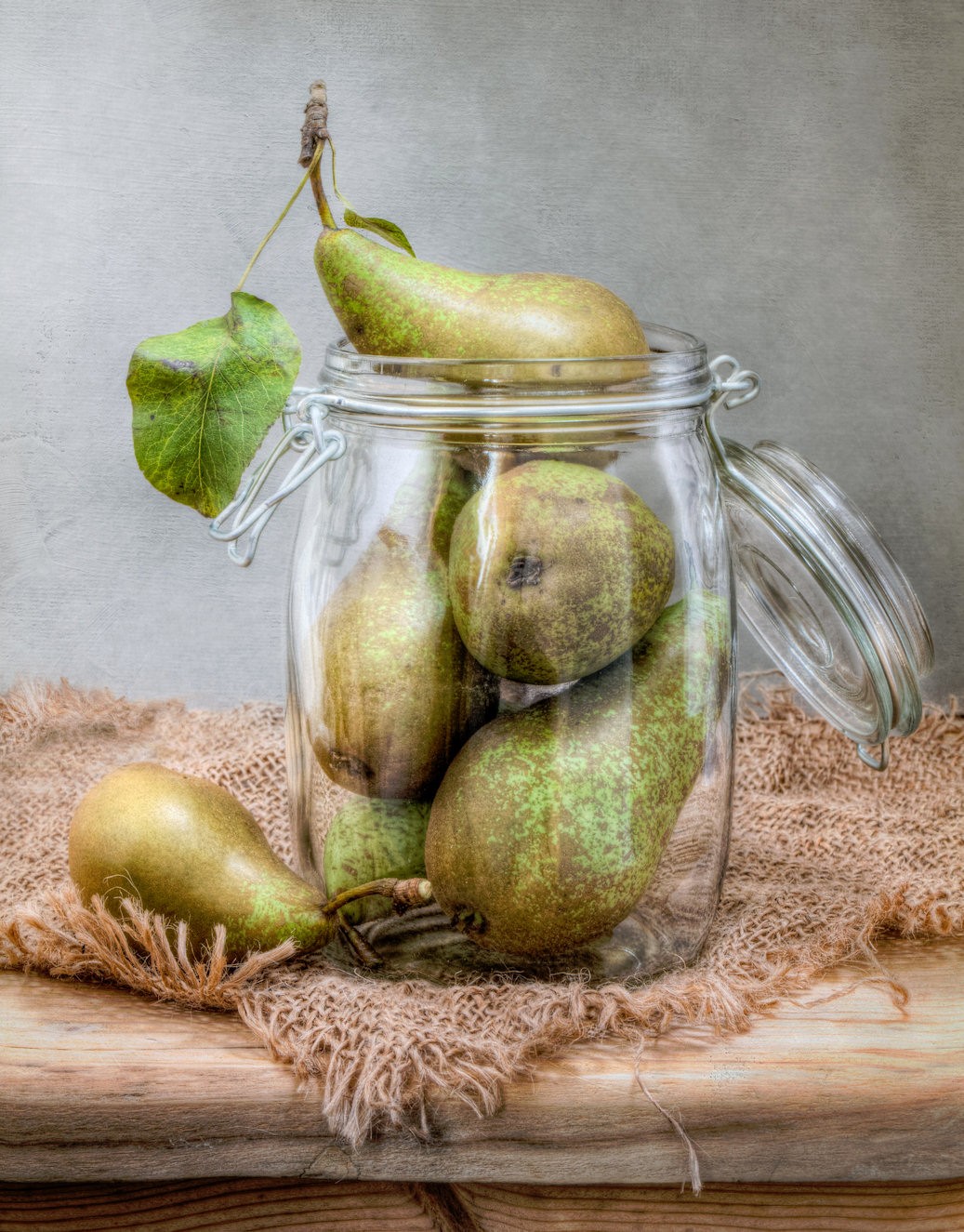Green pears in glass jar