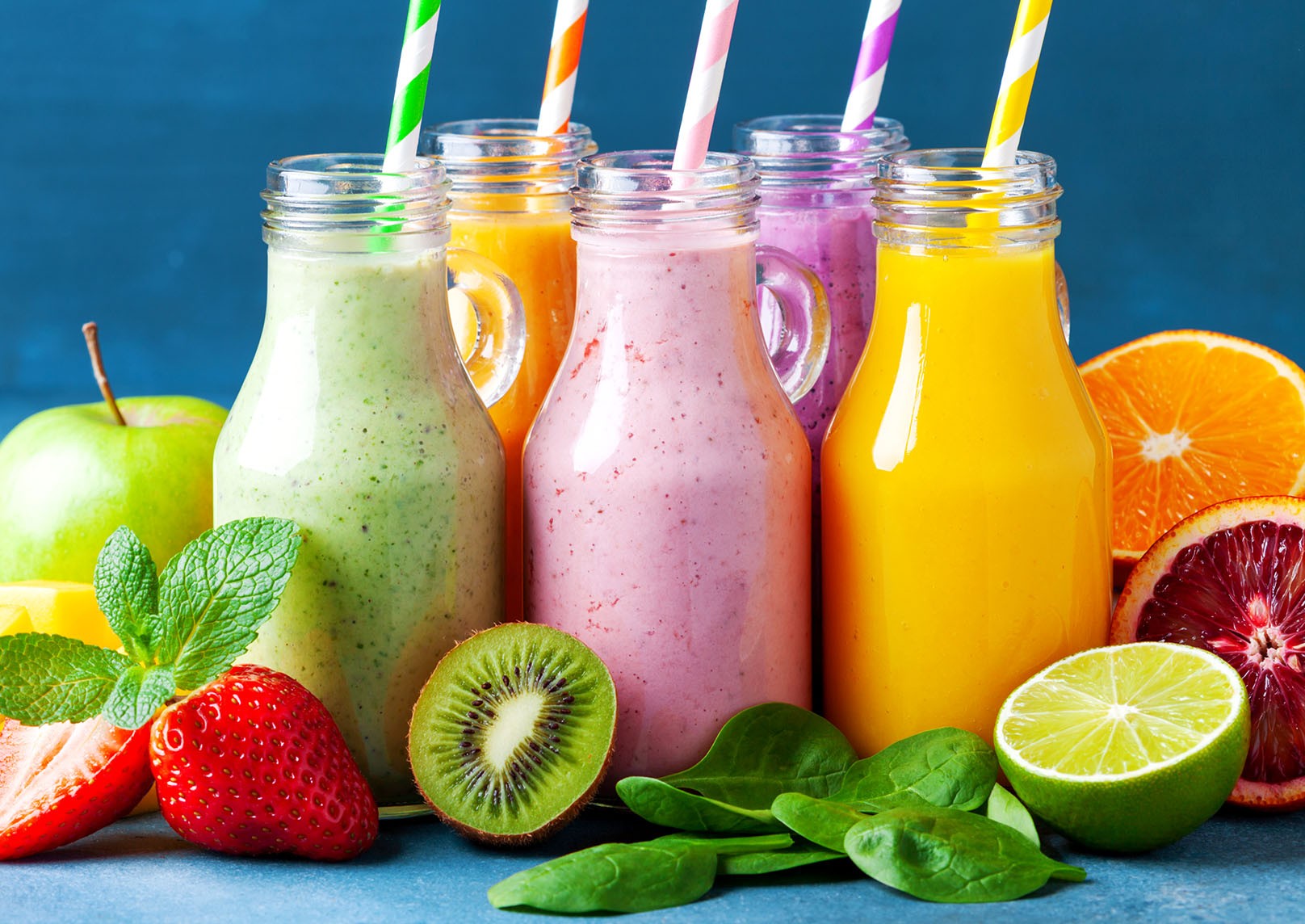 Colorful smoothies and fruit