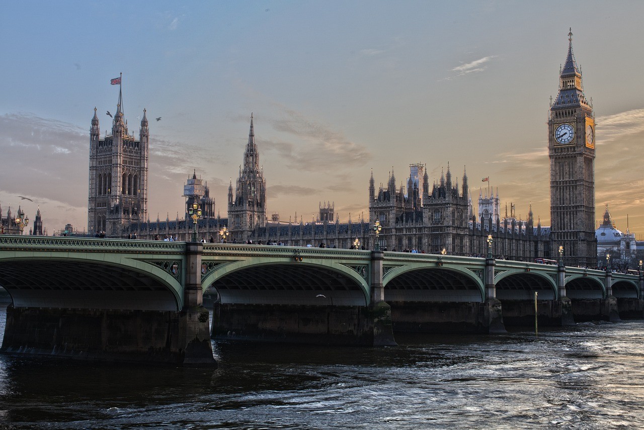 Bridge, clock tower and flag