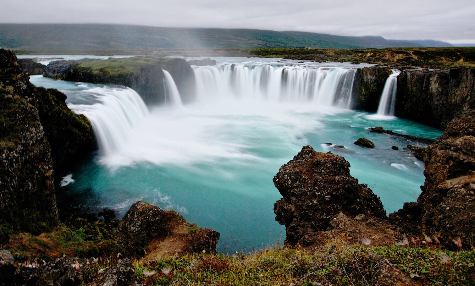 Waterfall next to river