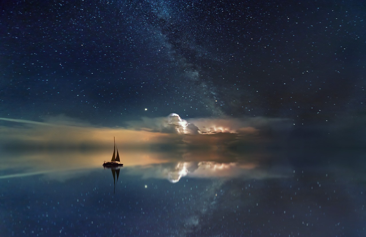 "Night sky, boat on lake, stars above water"