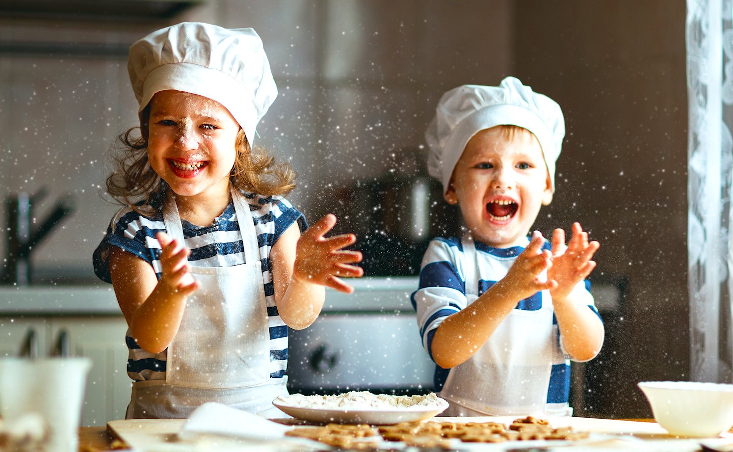 Children playing with flour