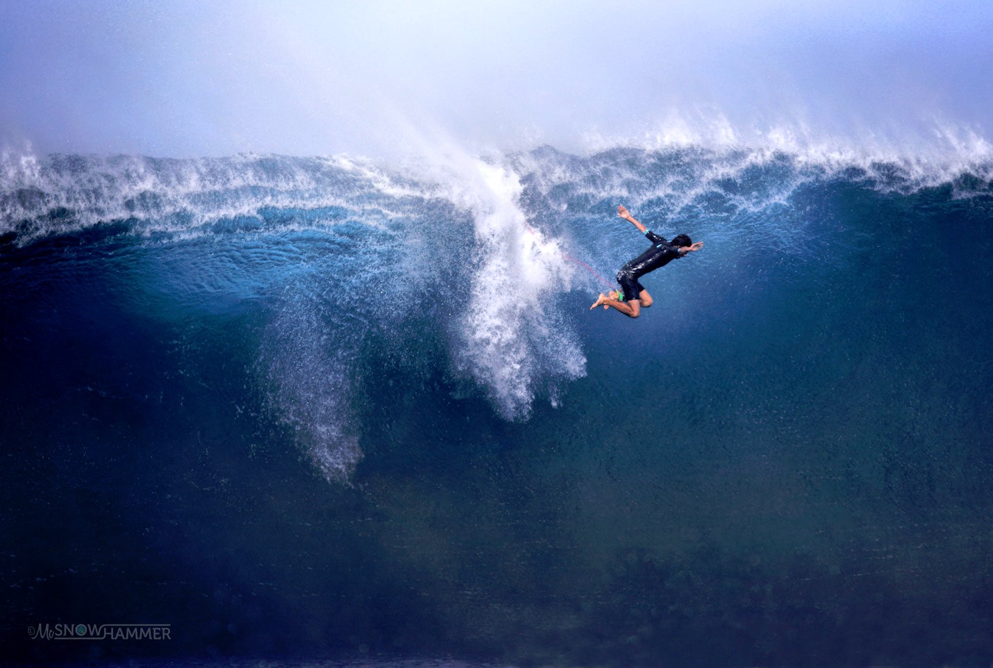 Huge wave surfer
